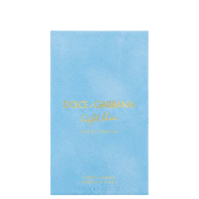 Caixa de item de perfumaria com tampa azul claro e rótulo com texto "Dolce & Gabbana Light Blue" em dourado.