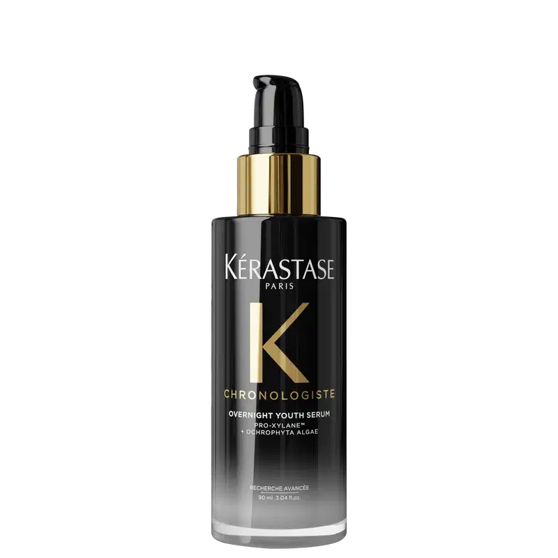 Frasco de sérum para cabelos Kérastase Chronologiste Overnight Youth Serum, com embalagem preta e dourada, contendo 90 ml do produto.