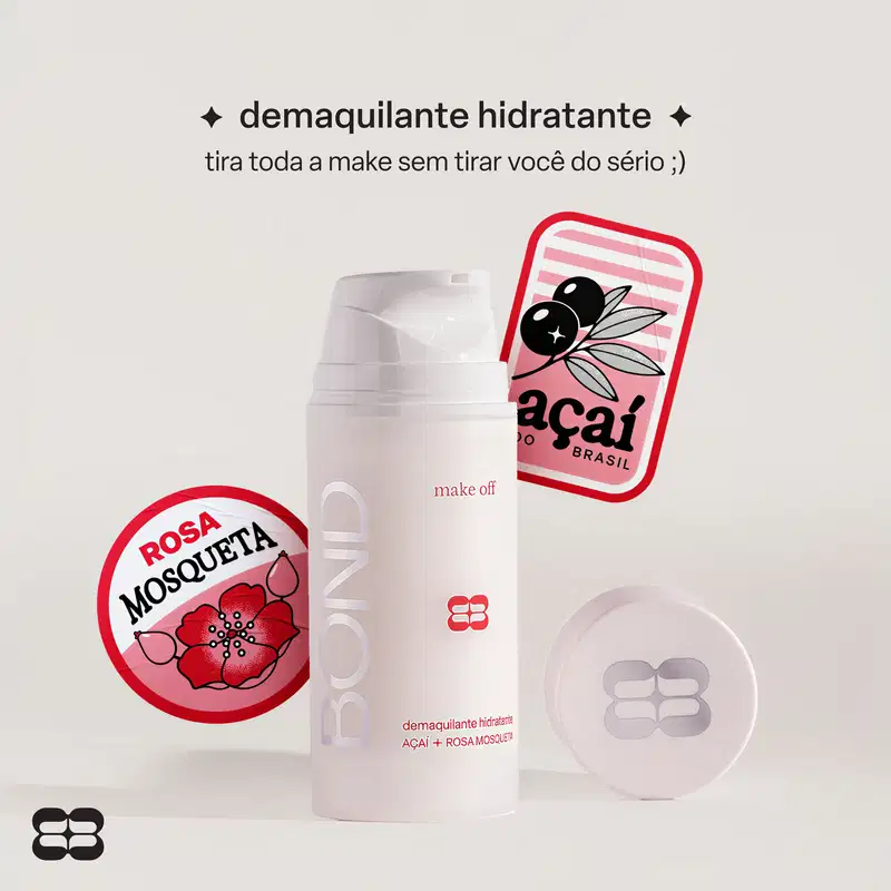 Embalagem branca de demaquilante hidratante da marca Bond Rio, com texto "demaquilante hidratante" e "tira toda a make sem tirar você do sério ;)". Logotipo da marca Açaí Brasil e ilustração de flor rosa.