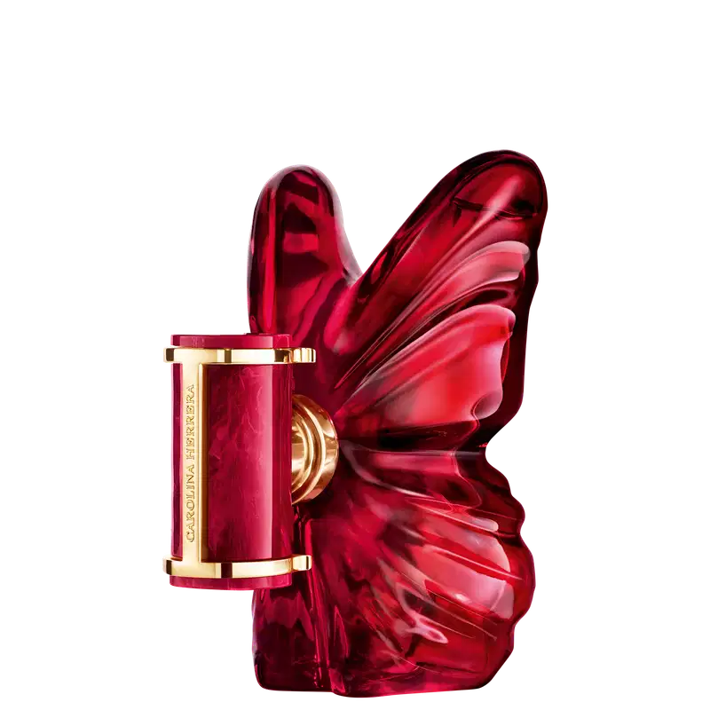 Frasco de perfume Carolina Herrera em formato de borboleta, com tampa dourada e corpo em tom vermelho intenso, destacando-se pela sua forma escultural e elegante.