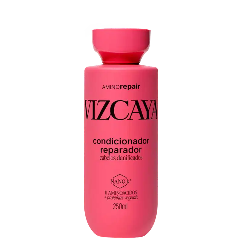 Frasco rosa de condicionador reparador Vizcaya Amino Repair, com 250ml de capacidade, contendo informações sobre os ingredientes e benefícios do produto em seu rótulo.