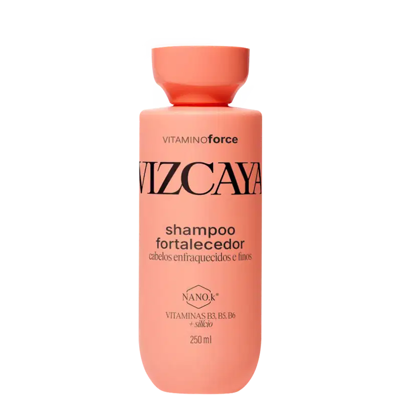 Frasco de shampoo Vizcaya Fortalecedor, com embalagem de cor coral predominante, contendo informações sobre os ingredientes vitamínicos e o benefício de cabelos enfraquecidos e finos.