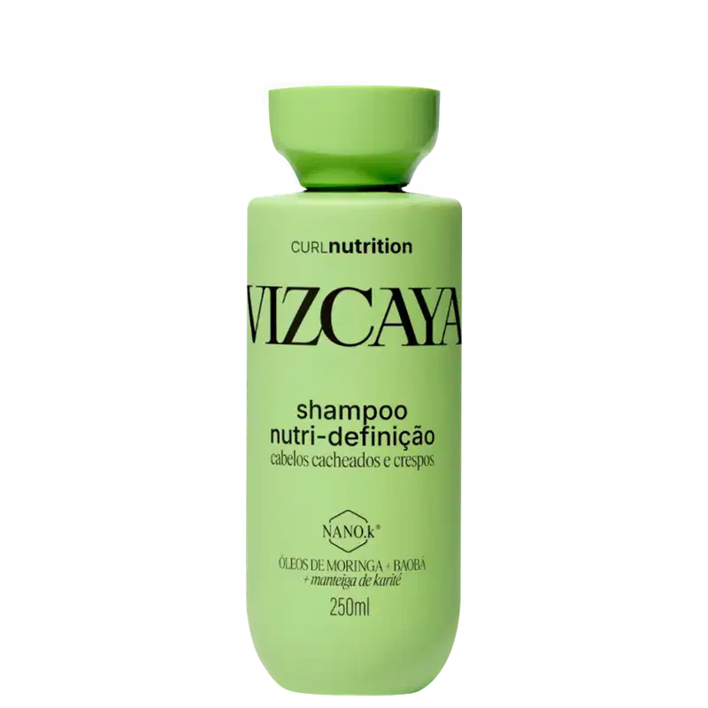 Frasco verde de shampoo Vizcaya Curl Nutrition com rótulo destacando "Nutri-definição" para cabelos cacheados e crespos, contendo óleos de moringa e baobá, além de manteiga de karité.