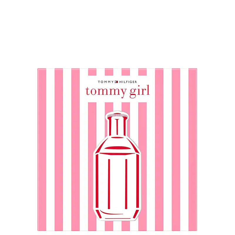Perfume Tommy Girl da Tommy Hilfiger em frasco de vidro com tampa vermelha e branca. Embalagem com listras rosa e branca verticais. Rótulo com logotipo da marca e nome do produto em vermelho.