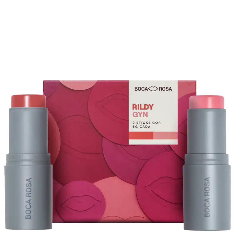 Boca Rosa Rildy Gyn, kit com 2 batons cor em sticks cinza e rosa, embalagem rosa com padrão de lábios, caixa branca e rosa ao centro.