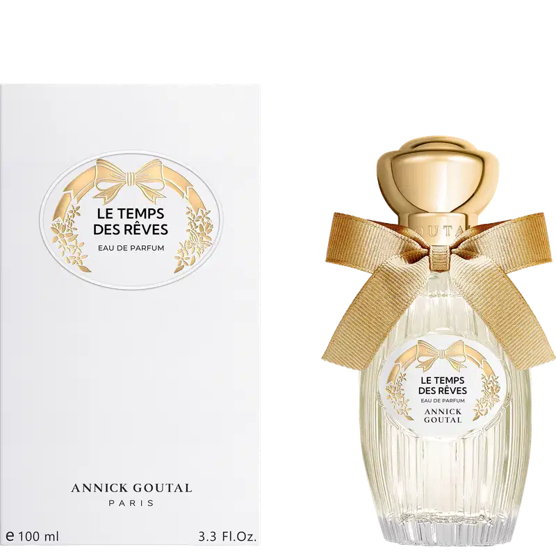 Eau de Parfum "Le Temps des Rêves" da Annick Goutal Paris. Frasco de vidro com tampa dourada e laço bege, acompanhado de embalagem branca com detalhes em ouro. Volume: 100ml/3.3 Fl.Oz.