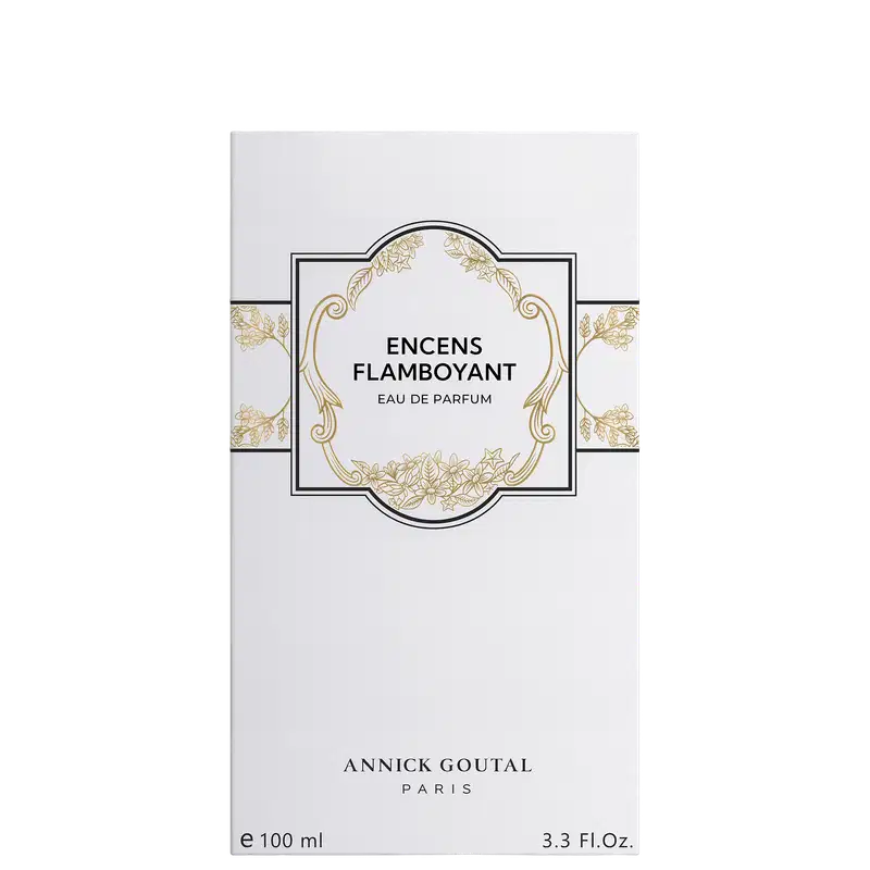 Eau de Parfum Encens Flamboyant da Annick Goutal Paris, 100ml. Embalagem branca com ornamentação dourada, rótulo central com moldura decorativa e detalhes florais. Marca de luxo francesa.