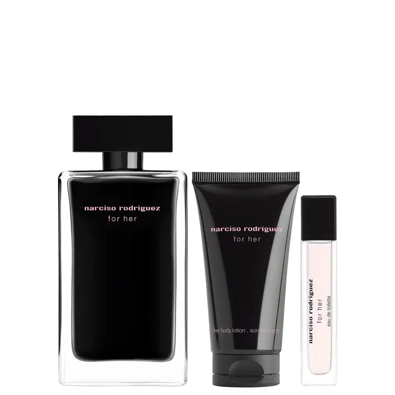 Conjunto Narciso Rodriguez for Her com três produtos: frasco de perfume retangular com líquido preto, tubo de body lotion preto e miniatura de eau de toilette. Embalagens em preto e branco com design minimalista.