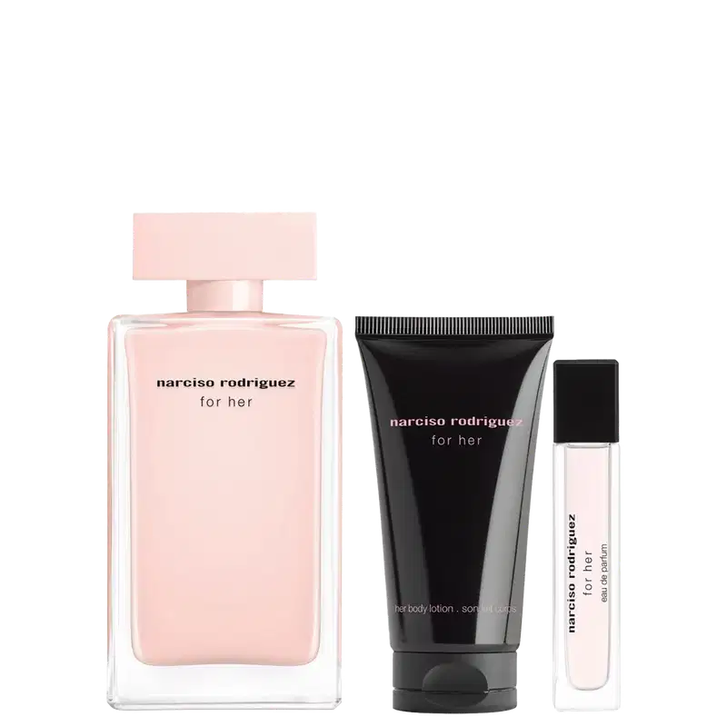 Conjunto Narciso Rodriguez for Her com três produtos: frasco de perfume rosa claro com tampa rosa, tubo de loção corporal preto e frasco de eau de parfum translúcido com tampa preta. Embalagens elegantes e minimalistas.