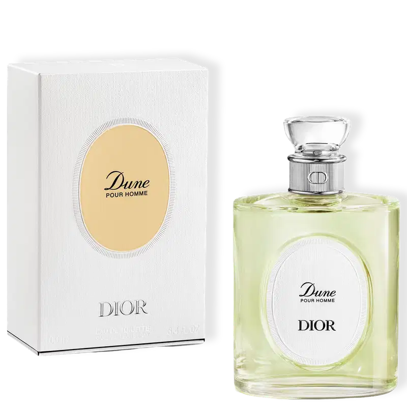 Perfume Dune Pour Homme Dior em frasco de vidro com líquido verde-claro, tampa cristalina e rótulo oval branco. Acompanha caixa branca com detalhe dourado e logotipo Dior em relevo.