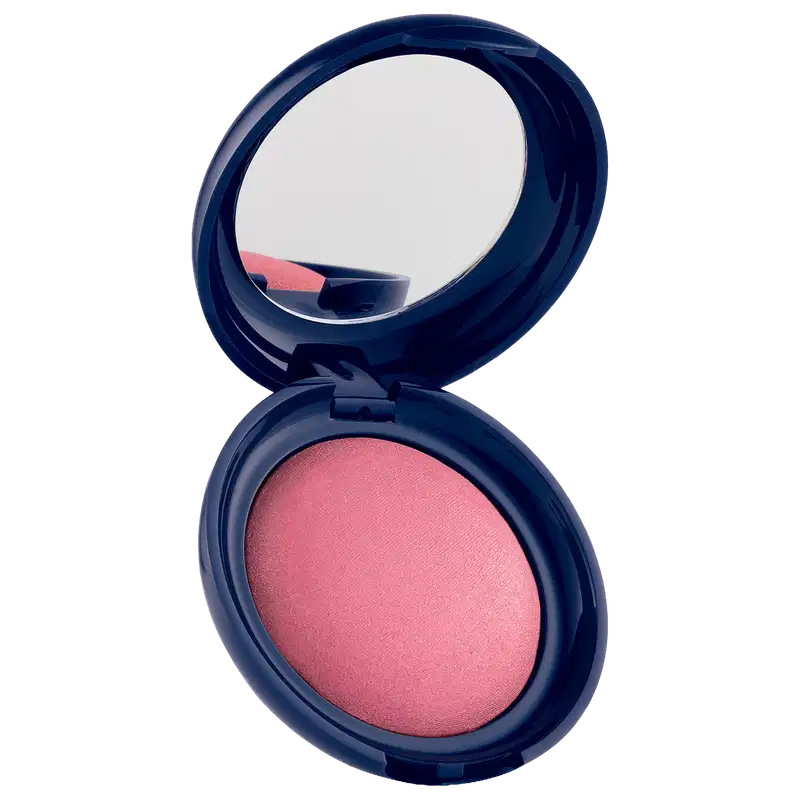 Blush em pó com embalagem redonda azul-marinho, espelho integrado na tampa e produto em tom rosa com acabamento luminoso.