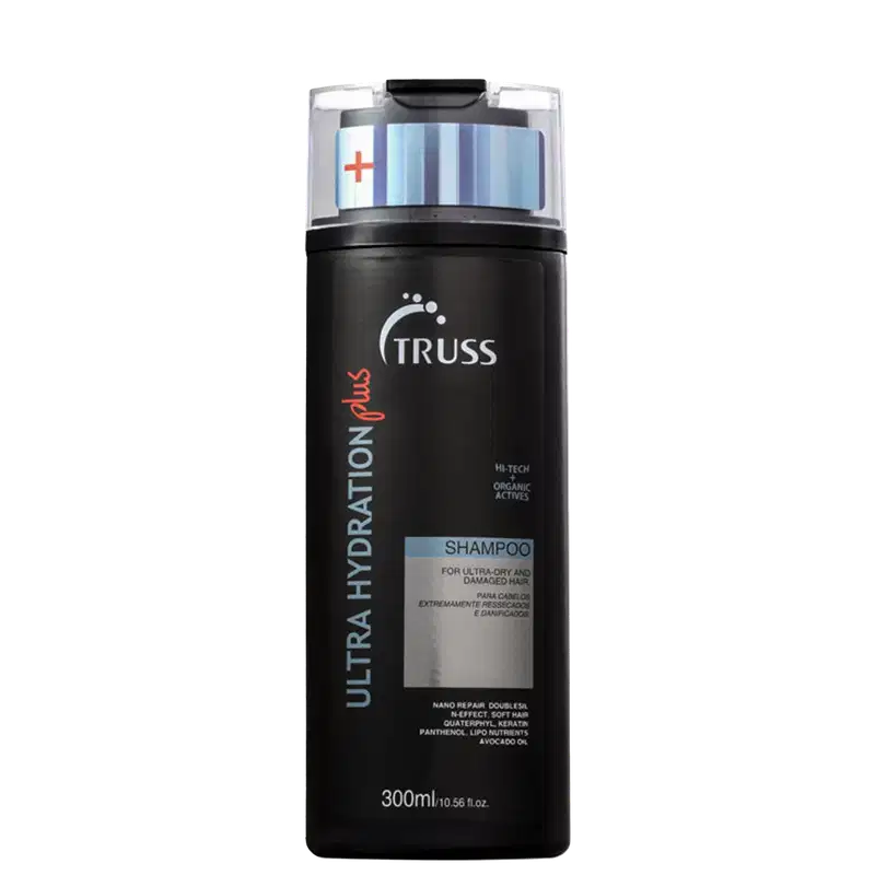 Frasco preto de shampoo da marca Truss, com rótulo em branco e vermelho. O produto é descrito como indicado para cabelos extremamente ressecados e danificados, contendo ativos orgânicos de alta tecnologia.
