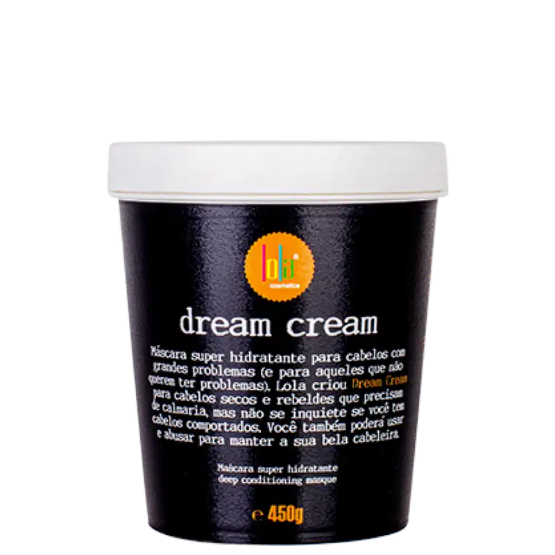 Pote preto com rótulo branco e laranja contendo "dream cream", uma máscara super hidratante para cabelos com problemas, de acordo com a descrição no rótulo. O produto é da marca Lola From Rio.