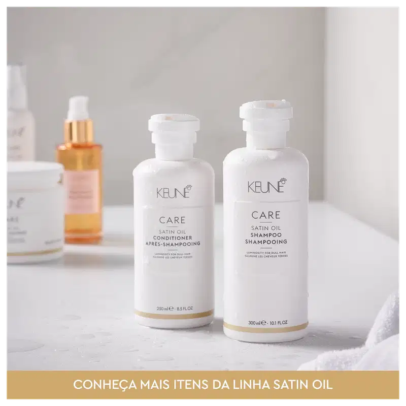 Frasco branco de 80 ml da linha Care da Keune, contendo o Shampoo de Óleo Satinado, com rótulo destacando a luminosidade para cabelos opacos.