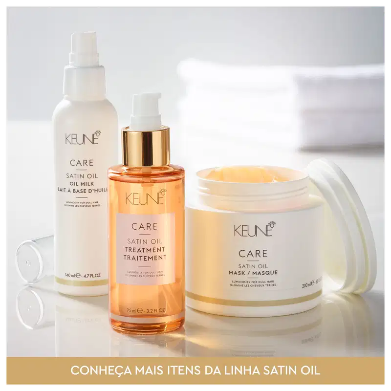 Frasco branco de 80 ml da linha Care da Keune, contendo o Shampoo de Óleo Satinado, com rótulo destacando a luminosidade para cabelos opacos.