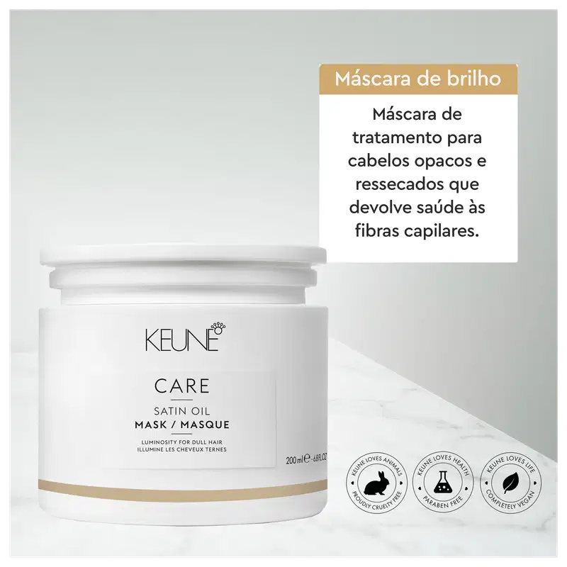 Embalagem branca de máscara de tratamento para cabelos opacos e ressecados da marca Keune, com rótulo em português indicando que o produto devolve saúde às fibras capilares. Frasco de 200ml com informações sobre os benefícios do produto.