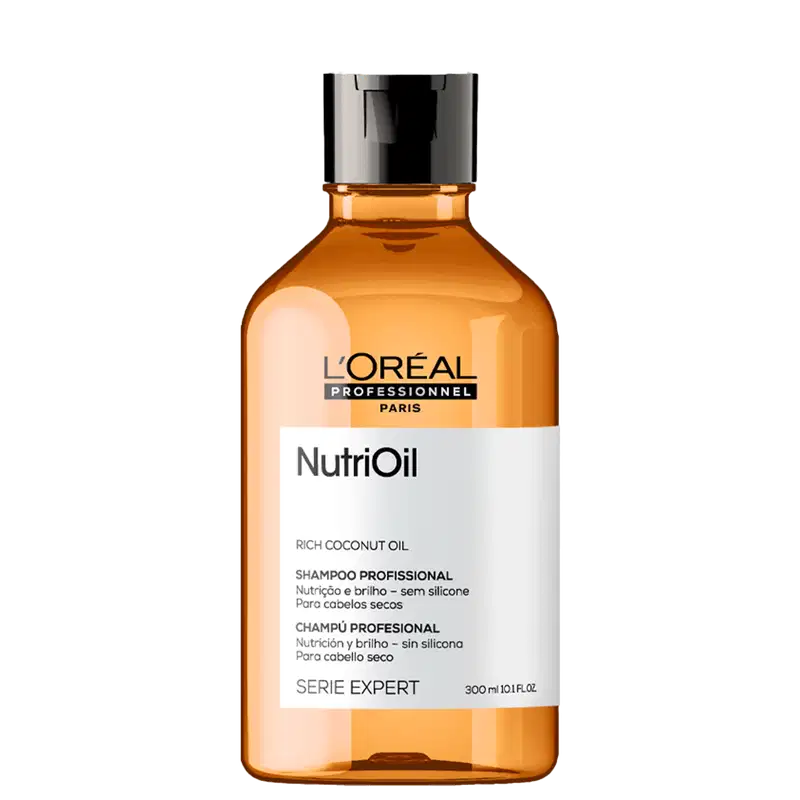 Frasco de item de perfumaria da marca L'Oreal Professionnel Paris, com rótulo "NutriOil" e "Rich Coconut Oil". O frasco é de vidro âmbar com tampa preta. O texto no rótulo indica que se trata de um xampu profissional para cabelos secos.