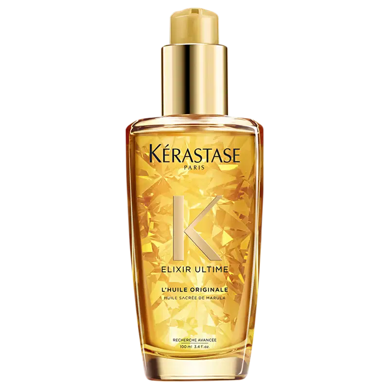 Frasco de óleo capilar Kérastase Elixir Ultime, com embalagem dourada e brilhante, apresentando o logotipo da marca e o nome do produto em destaque.