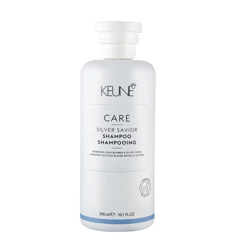 Frasco branco de 300 ml do shampoo Silver Savior da linha Care da Keune, que promete refrescar e tonalizar cabelos loiros e grisalhos.
