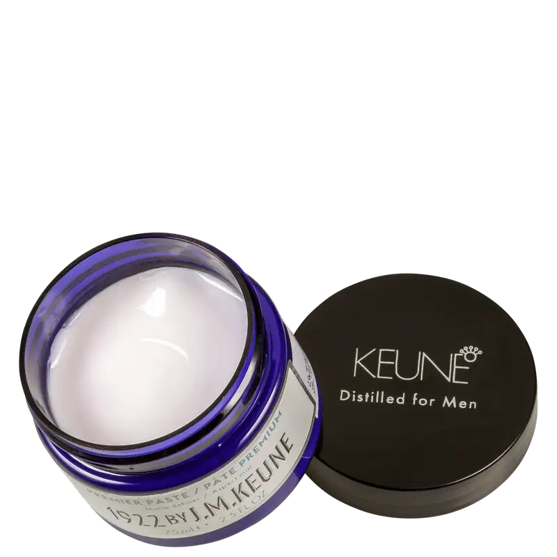 Frasco de creme para cabelos da marca Keune, com embalagem azul e preta, contendo 75ml do produto "Distilled for Men". O rótulo apresenta o nome da marca em destaque.