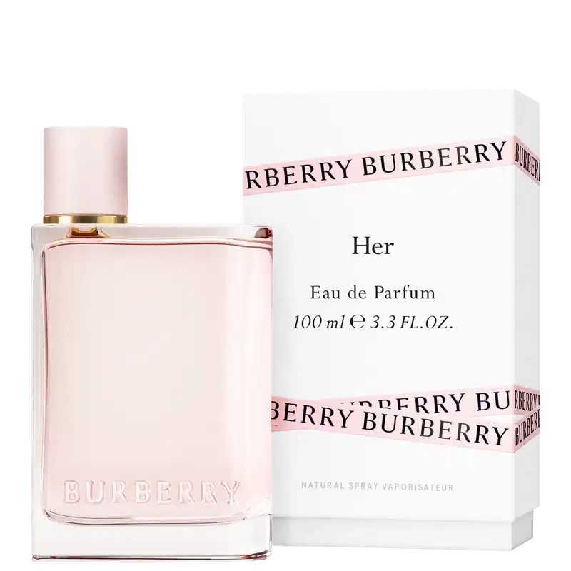Frasco de perfume Burberry de cor rosa pálido com tampa dourada. O rótulo em destaque exibe o nome da marca "BURBERRY" em letras brancas.