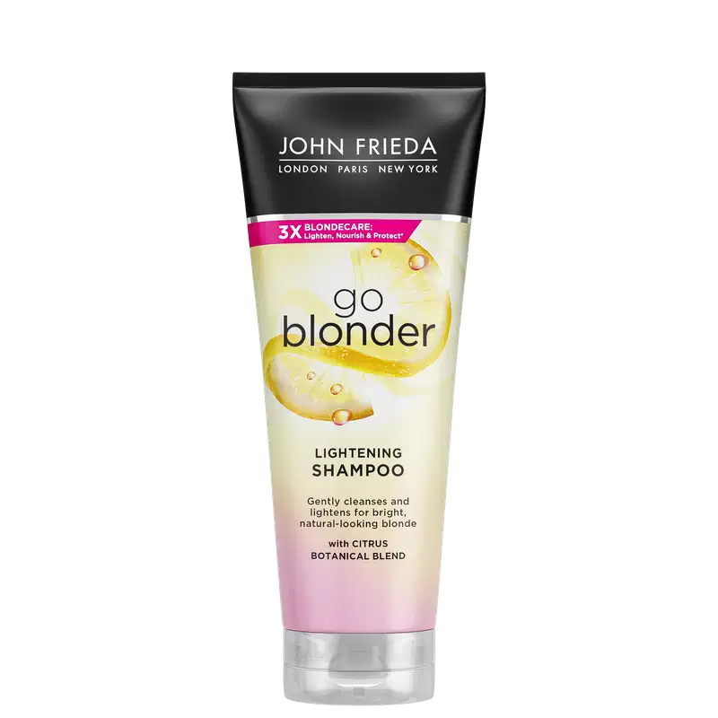 Embalagem plástica nas cores preta, amarela e rosa. Descrição indica que é um shampoo clareador e nutritivo para cabelos loiros naturais e brilhantes. Apresenta imagens de fatias de limão e gotas.
