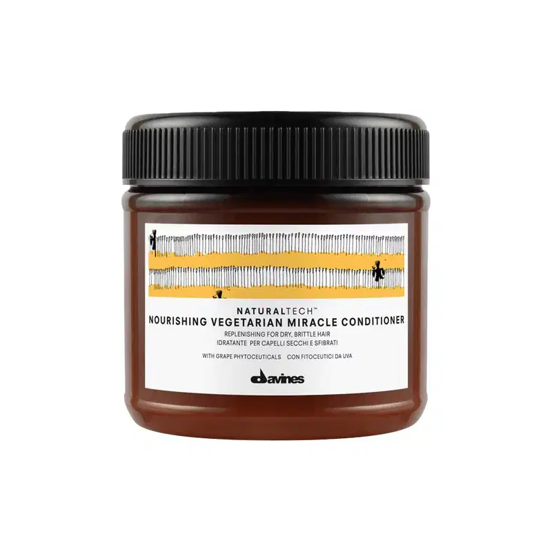 Frasco de condicionador de cabelo Naturaltech da Davines, com tampa preta e rótulo com informações sobre o produto, que promete nutrir e reparar cabelos secos e quebradiços.