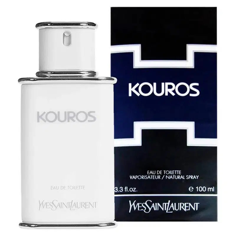 Frasco de perfume Kouros da Yves Saint Laurent, com design elegante e minimalista em tons de branco e cinza. O rótulo destaca o nome da fragrância em letras grandes e o texto "Eau de Toilette" abaixo.