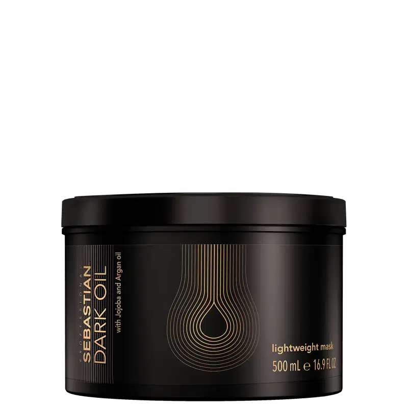 Máscara leve da linha Sebastian Professional Dark Oil, em embalagem preta com detalhes dourados, contendo 500 ml do produto.