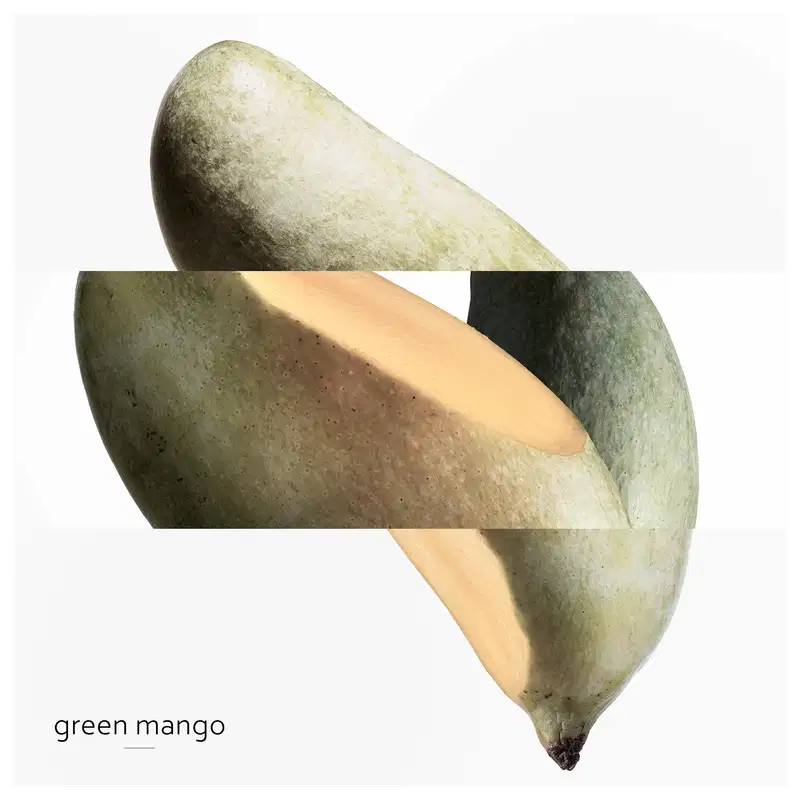 Pedaços de manga verde, ilustrando as notas que compõem o perfume.