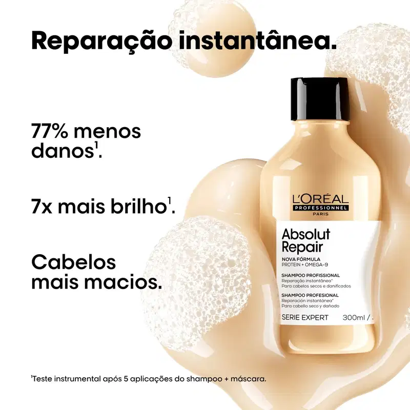 Frasco de shampoo profissional L'Oréal Absolut Repair, com fórmula de proteína e ômega-9, para cabelos secos e danificados. Embalagem preta e bege, com destaque para os benefícios de reparação instantânea e brilho 7x maior.