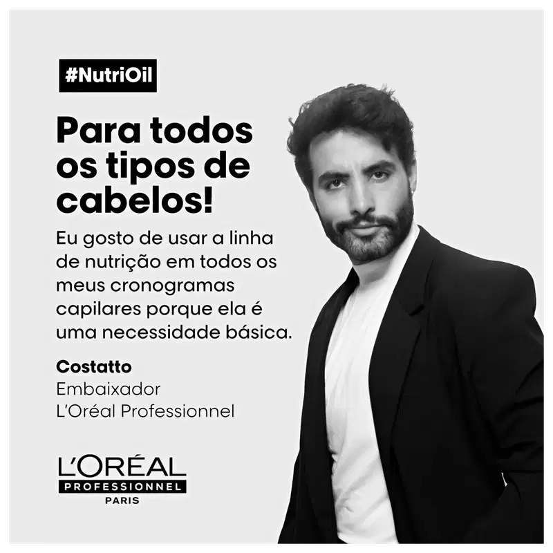 A imagem apresenta um homem com barba e cabelos escuros vestindo um terno preto, em um ambiente monocromático, com destaque para a marca L'Oréal Professionnel, que promove uma linha de nutrição capilar para diferentes tipos de cabelos.