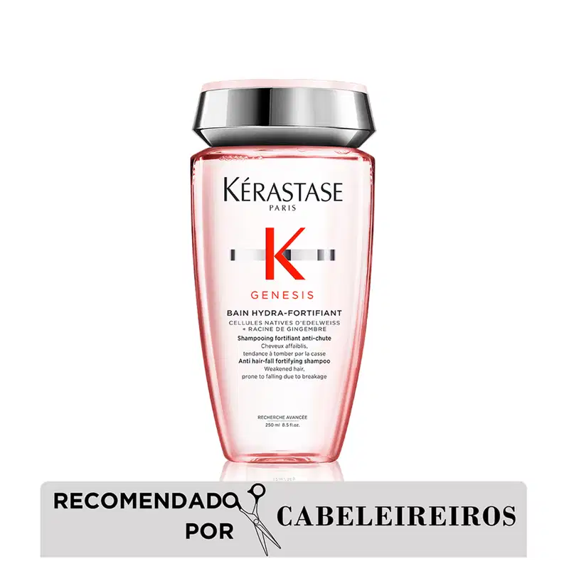 Frasco de shampoo da marca Kérastase Paris, da linha Genesis, com embalagem rosa e prata. O rótulo apresenta o nome da marca, da linha e informações sobre o produto, que é um shampoo fortificante anti-queda.