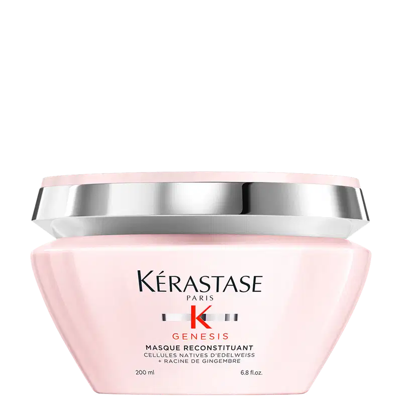 Frasco rosa de 200 ml da máscara Reconstituant Kérastase Genesis, com rótulo destacando os ingredientes ativos de células nativas de edelweiss e raiz de gengibre.