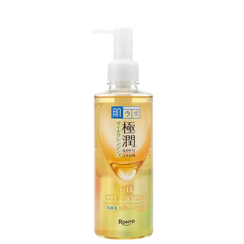 Frasco de limpeza facial em óleo da marca Rohto, com bomba dosadora, em embalagem de vidro transparente com rótulo azul e amarelo. O produto é chamado de "Hada Labo Gokujyun Cleansing Oil".