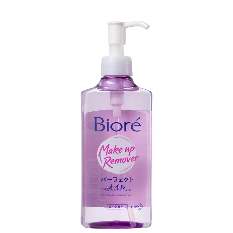 Embalagem plástica transparente com líquido lilás dentro. Bomba dosadora branca na parte superior. Rótulo com o nome do produto "Make up Remover" e a descrição "Bioré Perfect Oil" em inglês e japonês.