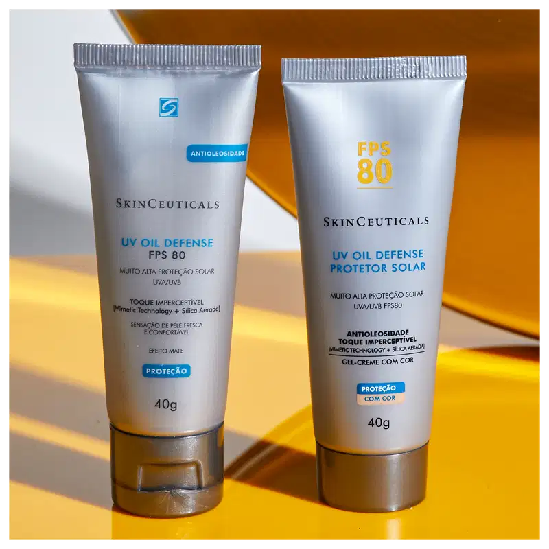 Tubo de protetor solar SkinCeuticals FPS 80 com tecnologia antimanchas, embalagem branca com detalhes em amarelo, informações sobre o produto e sua composição.