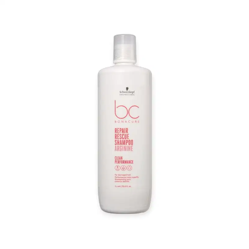 Frasco branco da linha Bonacure da Schwarzkopf Professional, contendo o Repair Rescue Shampoo Arginine, produto para cabelos danificados com desempenho limpo, conforme indicado no rótulo.