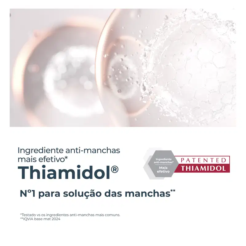 Embalagem de produto de perfumaria com ingrediente anti-manchas patenteado chamado Thiamidol, apresentado como solução efetiva para manchas na pele.