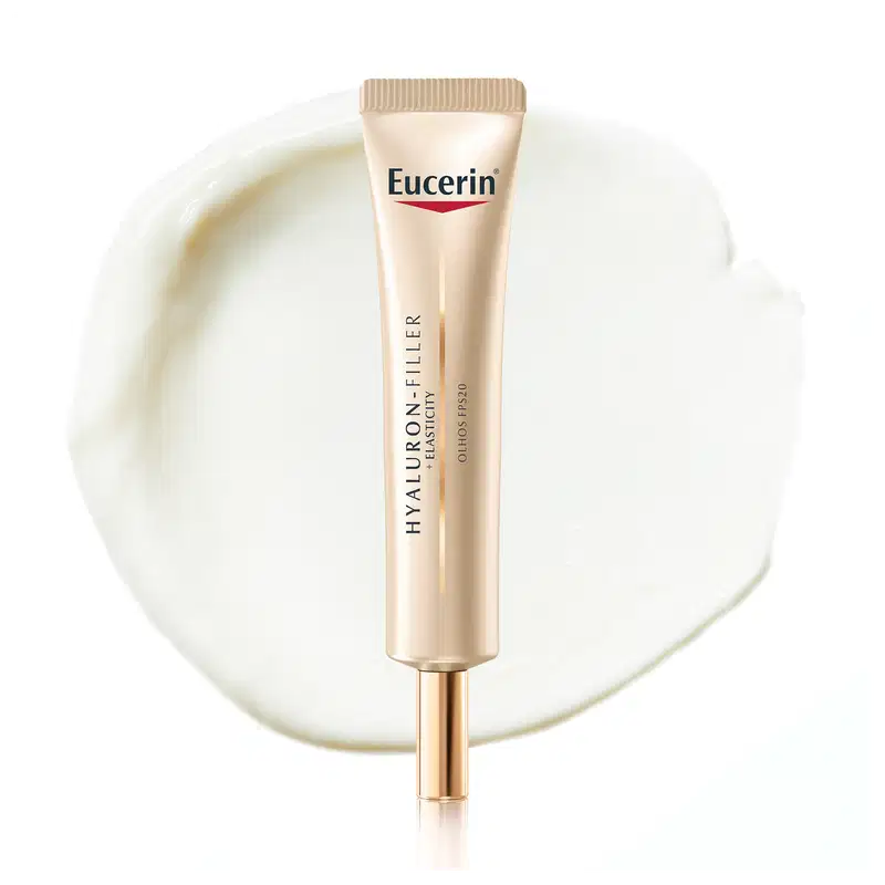Tubo de item de perfumaria da marca Eucerin com textura cremosa, brilhante e translúcida, posicionado sobre superfície branca.