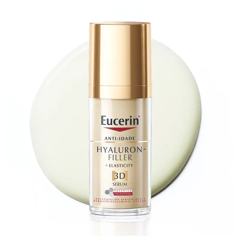 Frasco dourado de item de perfumaria Eucerin com textura lisa, brilhante e transparente, contendo um soro líquido claro em fundo branco.