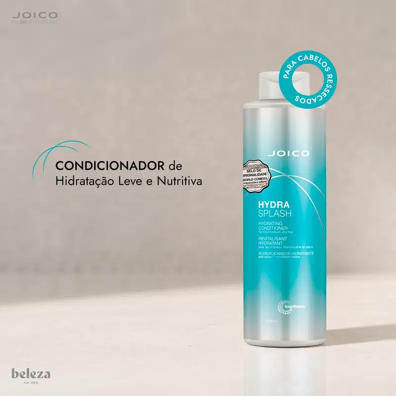 Embalagem branca e azul da marca Joico com texto "Hydra Splash Hydrating Conditioner" e "Revitalisante Hydratant" indicando ser um condicionador hidratante para cabelos.