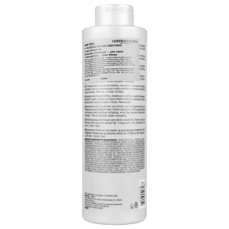 Parte de trás do frasco do condicionador Joico K-PAK To Repair Damage 1c Litro, com rótulo em inglês e espanhol, contendo informações sobre o produto e seus ingredientes.