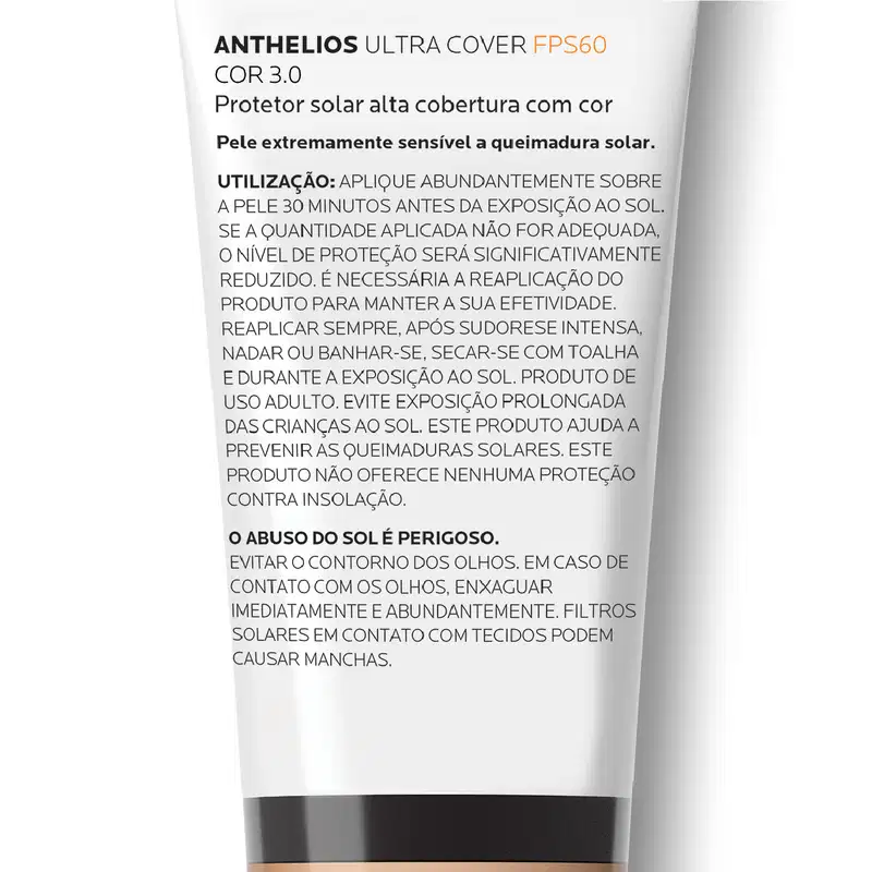 Embalagem de protetor solar em tubo branco com rótulo preto e laranja, indicando ser um produto da marca Anthelios com FPS 60 e cor 3.0. O rótulo descreve as características do produto e instruções de uso.