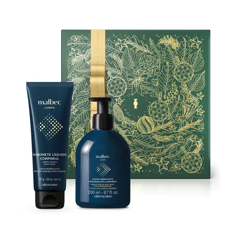 Imagem de kit com produtos de corpo e banho da marca Malbec, composto por frasco de loção hidratante corporal e bisnaga de sabonete líquido, ambas em embalagens azul-marinho com letras douradas e caixa de presente decorativa com estampa floral dourada.