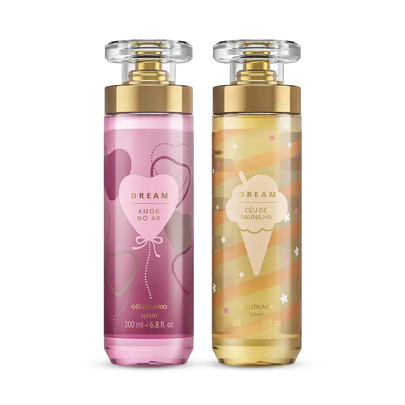 Imagem de dois frascos de body splash Dream,, sendo um com rótulo em tons de roxo da linha Amor no Ar e outro com rótulo em tons de dourado da linha Céu de Baunilha. Ambos recipientes são de vidro, com tampa transparente e válvula spray dourada.