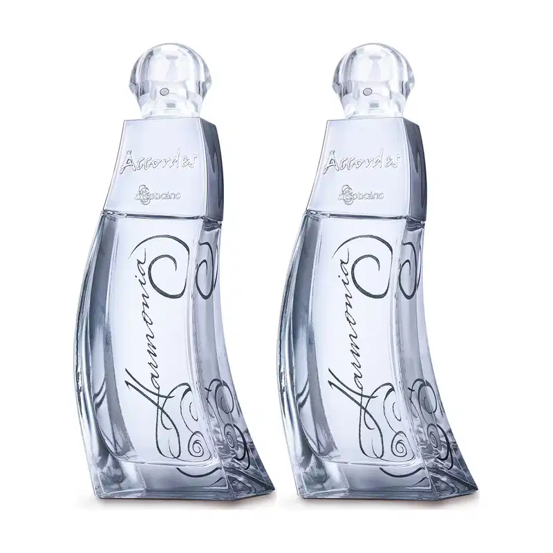 Imagem de dois frascos de vidro transparente azulado com rótulos da marca Accordes Harmonia, contendo uma fragrância floral com design elegante e texto manuscrito em preto.