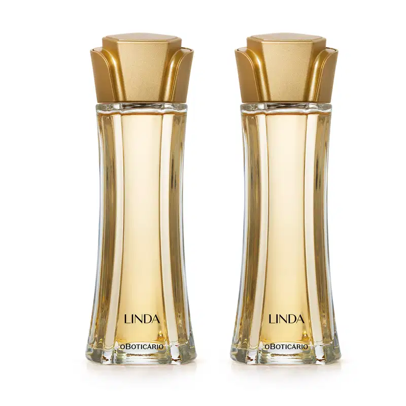 Imagem de dois frascos de desodorante colônia Linda, em embalagem de vidro transparente com líquido bege e tampa em formato de flor na cor dourada. O rótulo traz o nome da marca em letras pretas. Transmite beleza e elegância.