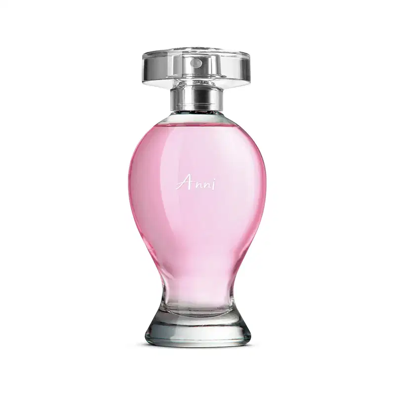 Vidro curvilíneo transparente com liquido rosa, pulverizador prateado e tampa cristal contendo 100ml de desodorante colônia Boticollection Anni.