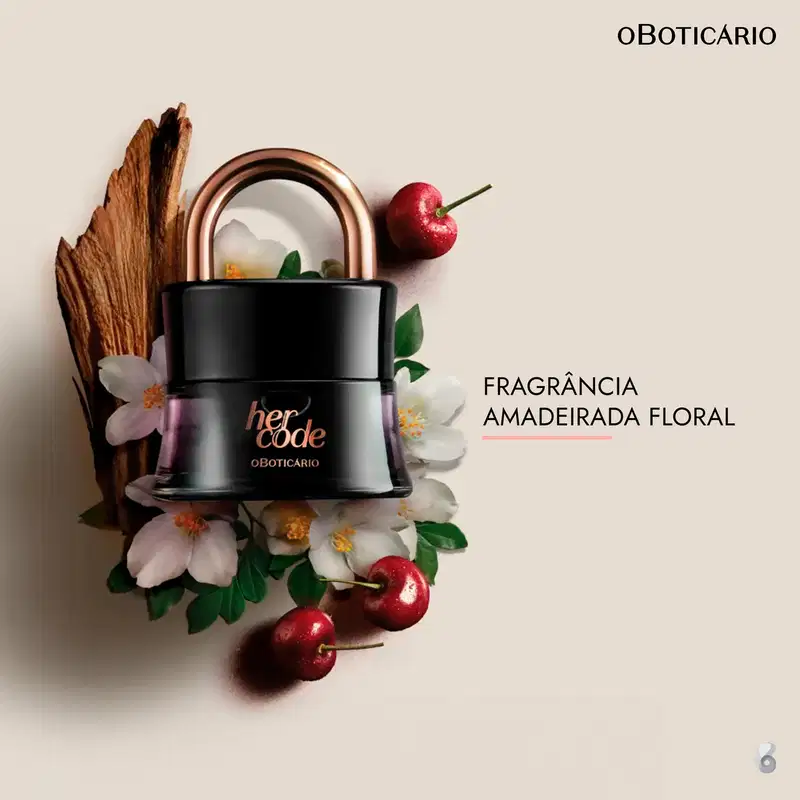 Na imagem, o produto está cercado por elementos naturais como um galho de madeira envelhecido, flores brancas, folhas verdes e cerejas vermelhas brilhantes. A composição remete a ingredientes naturais e botânicos usados na formulação do produto.